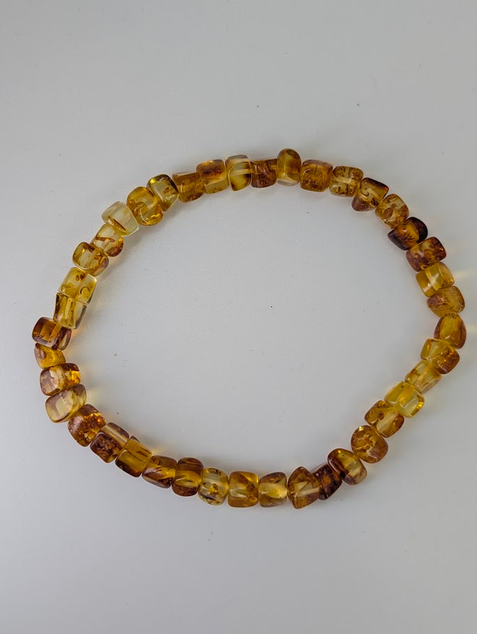 Full view of Baltic Amber Bracelet 5.5 mm – golden honey tone and even profile