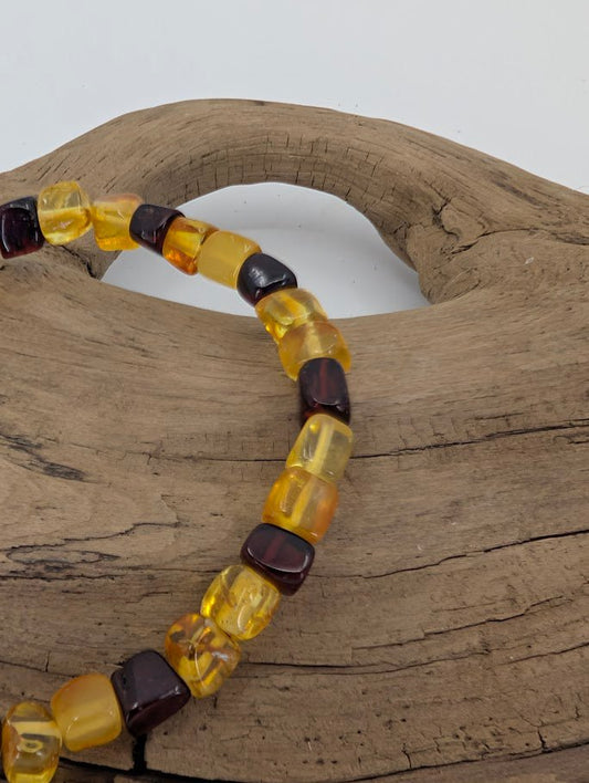 Baltic Amber Bracelet 6 mm – angled close-up highlighting color contrast and clarity