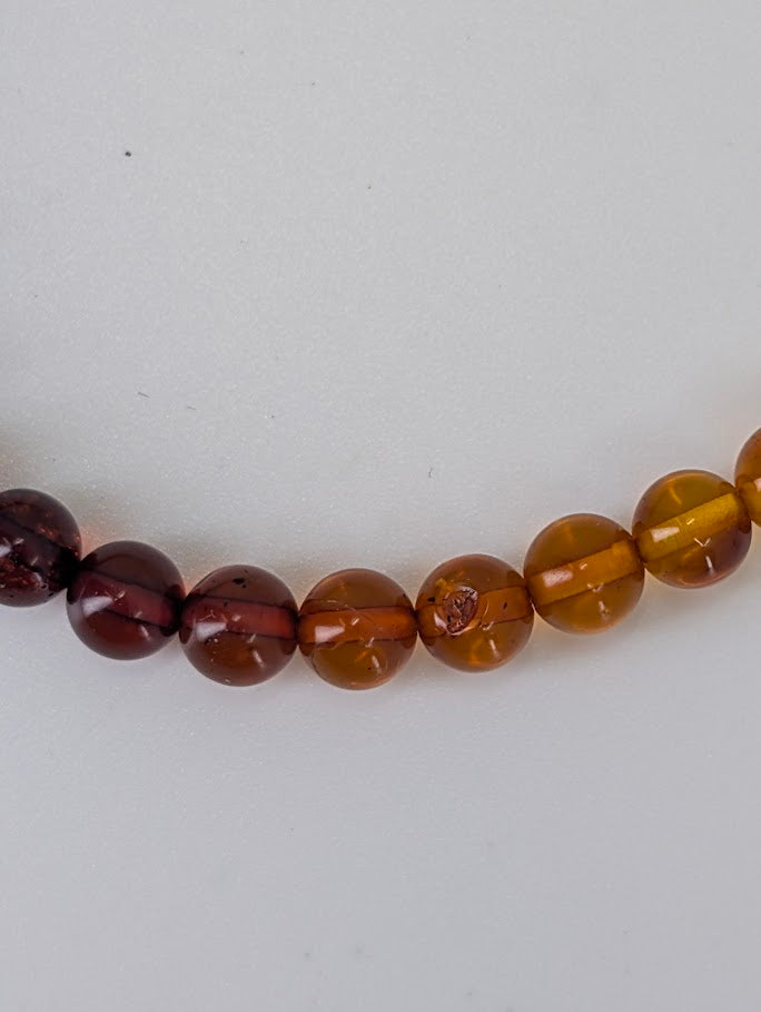 Baltic Amber Bracelets 4 mm and 4.8 mm – detailed close-up highlighting clarity and polish