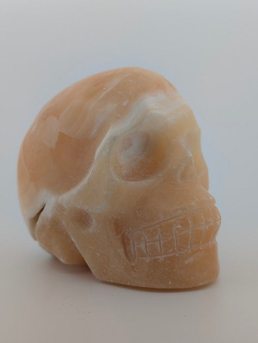 Orange Calcite Crystal Skull ~500g hand-carved carving with warm orange glow