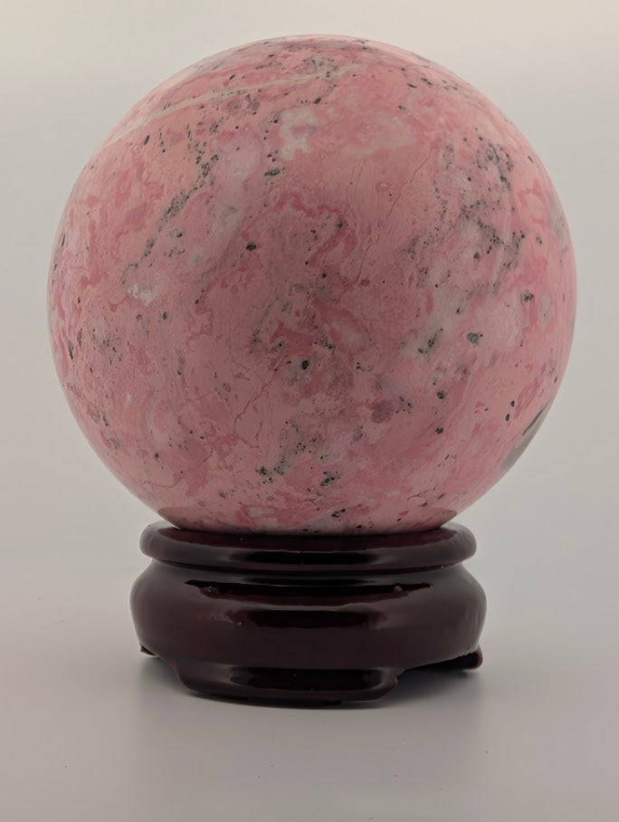 Pink Peruvian Rhodonite Sphere (D) – 80 mm / 925 g
