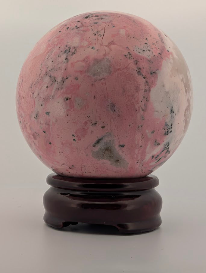 Pink Peruvian Rhodonite Sphere (D) – 80 mm / 925 g