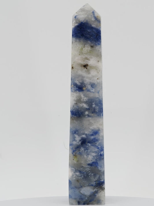 Polished Afghanite tower from Badakhshan featuring deep cobalt blue and white crystalline patterns.