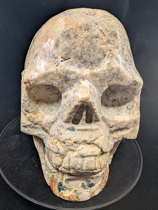 Front view of Blue Apatite • Sunstone • Jasper Skull — 4.7 kg museum-scale carving