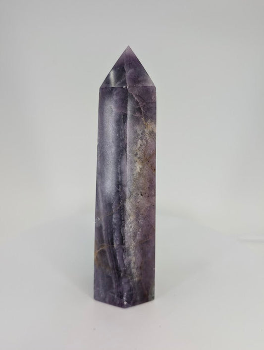 Fluorite tower – side view showing layered purple bands