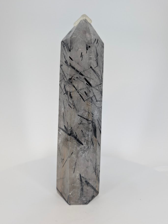Black Tourmaline inclusions in clear quartz tower
