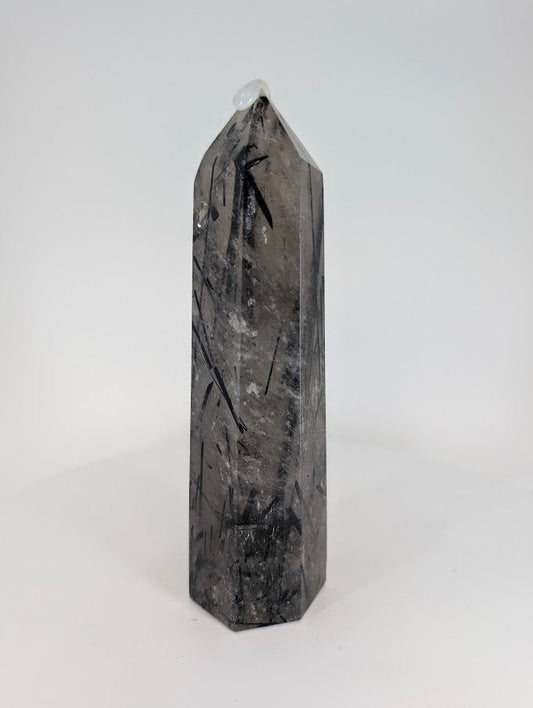 Polished Brazilian tourmalinated quartz – side profile