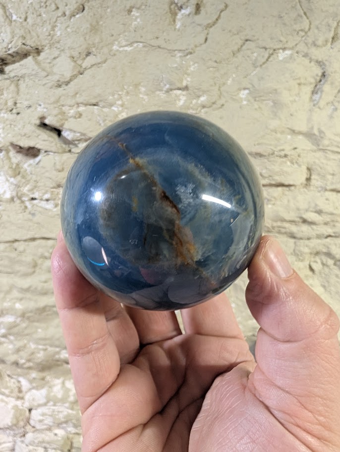 Back view with visible rust-colored seam and rich blue zoning