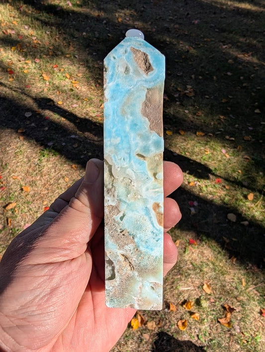 Caribbean Calcite Tower #2 side profile – elongated slim tower showing natural banding and cavities