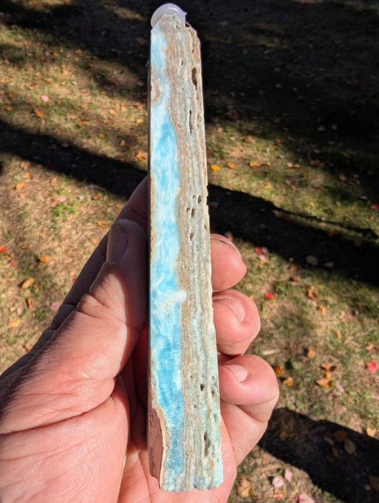 Caribbean Calcite Tower #6 side profile — vertical aqua calcite banding with aragonite layers