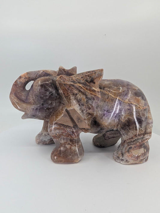 Chevron Amethyst elephant carving, left side angle