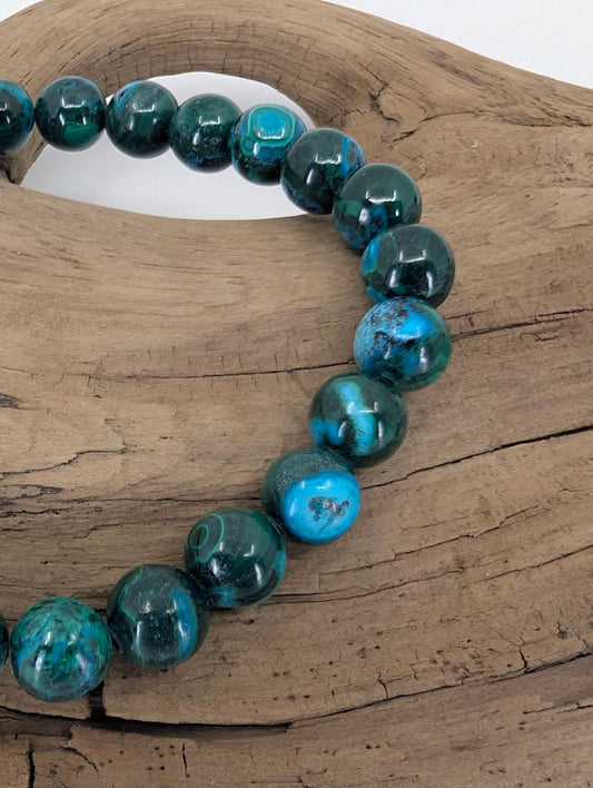 Close-up of Chrysocolla beads showing natural veining