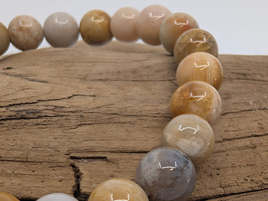 Coral Jade Bracelet – 8mm Polished Beads - Legacy Crystals and Minerals
