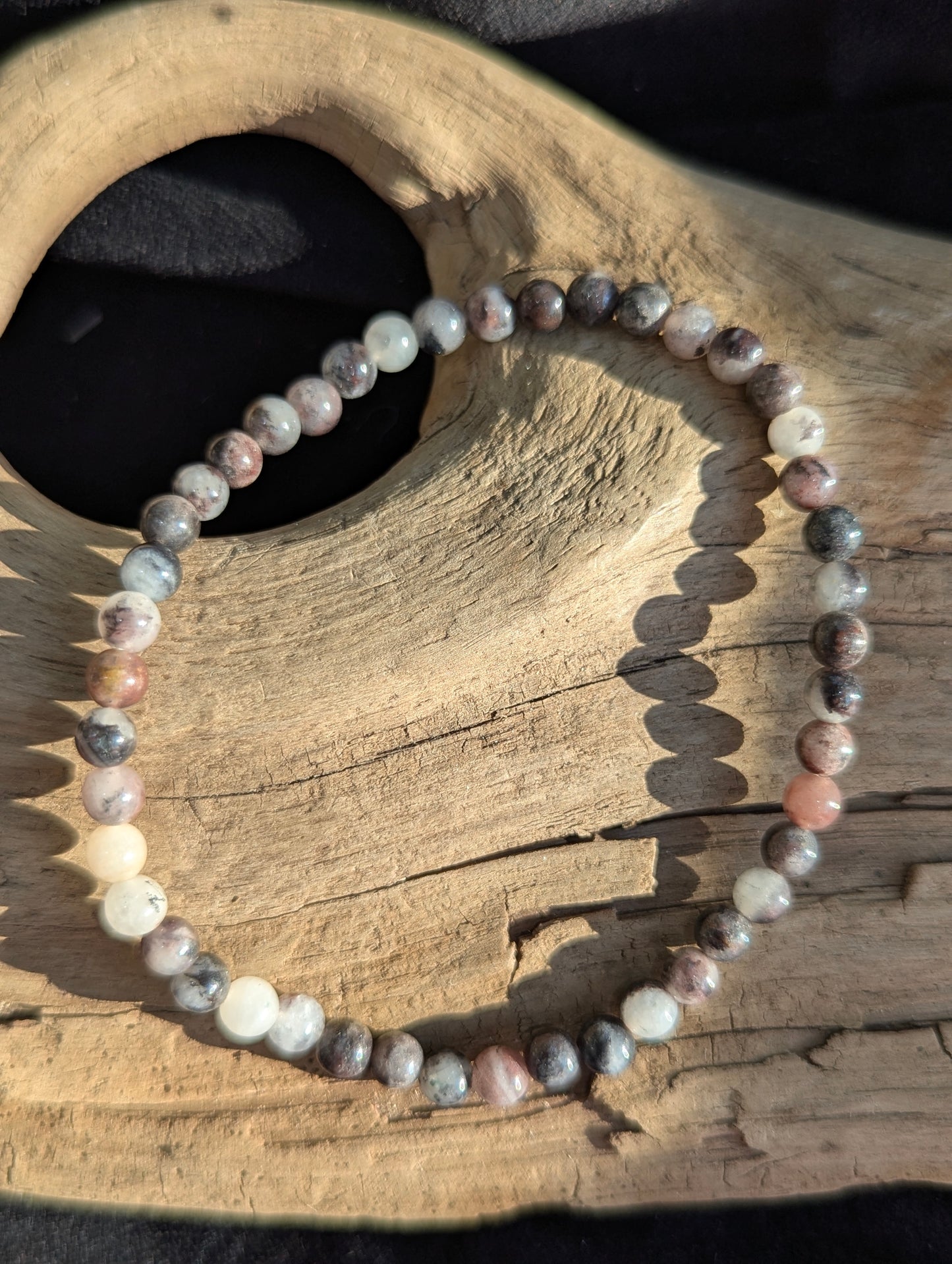 Premium 4mm Dragon Bloodstone beaded stretch bracelet worn on the wrist to demonstrate its 18cm (7.08") circumference scale and continuous mineral profile under balanced light.