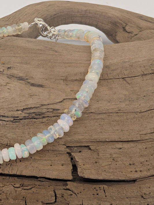 Closeup of Ethiopian opal bracelet clasp and 3.6mm fire opal beads