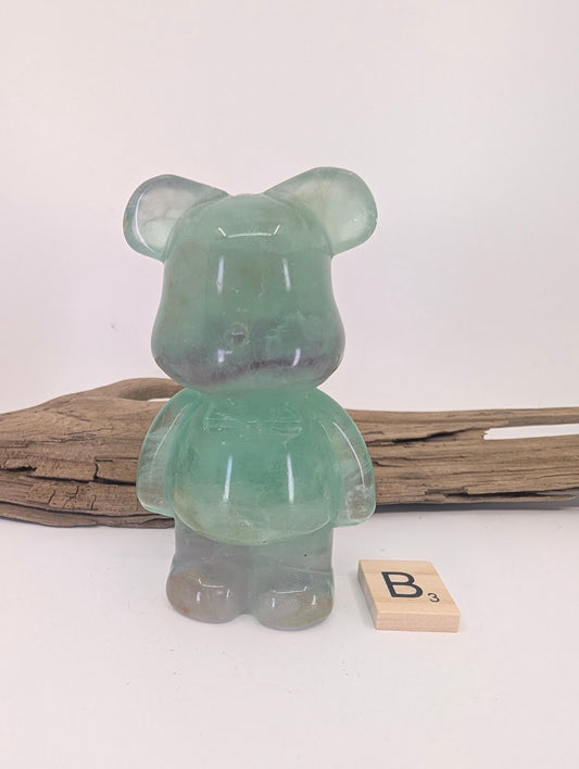 Translucent Green Fluorite bear carving specimen B with high-clarity polished finish.