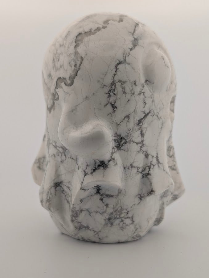 Hand-carved White Howlite ghost with grey veining, 4x3 inches, 600g