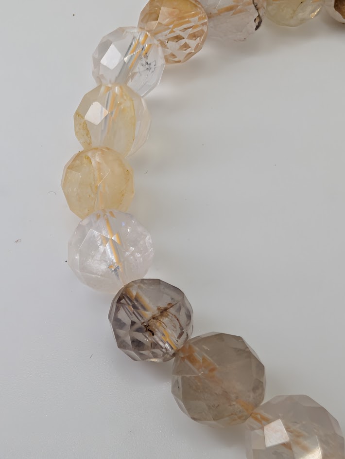 Detailed view of Golden Healer Quartz showing hematite inclusions and shine