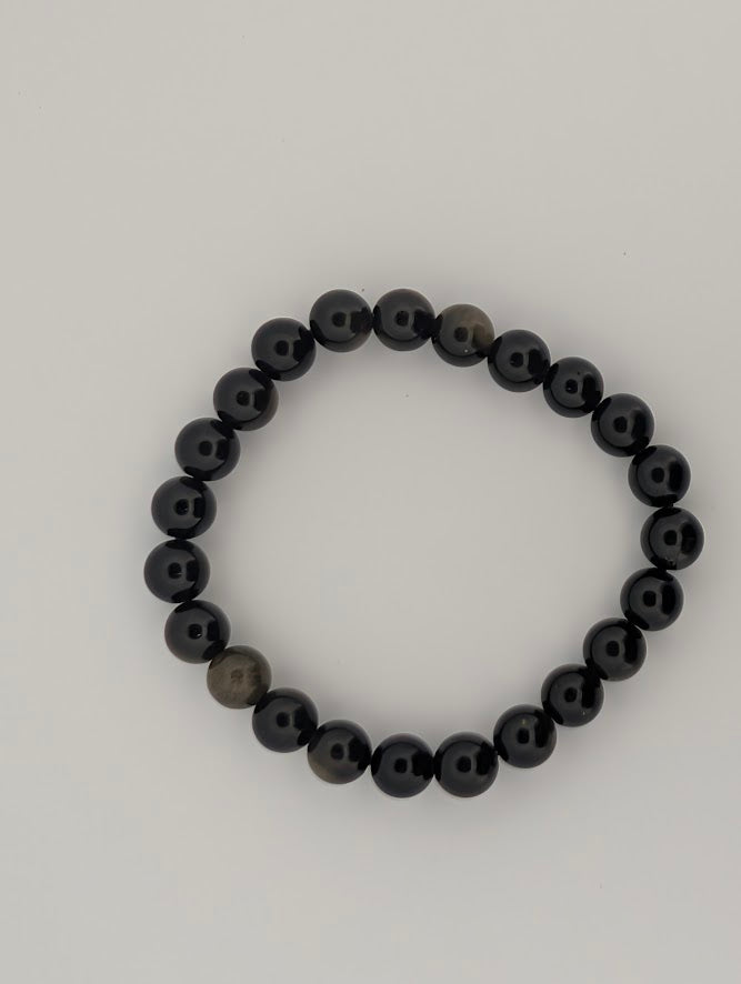 Overhead view of 6mm golden obsidian beaded bracelet in a circle