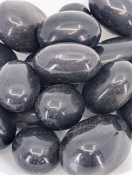 Close-up of Golden Obsidian showing golden sheen and polish