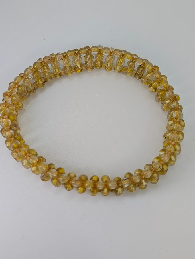 Detail of golden rutile shimmer under natural light