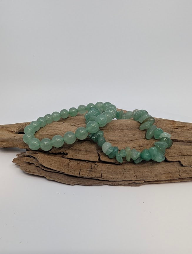 Green aventurine bracelets — 8mm round and chip styles on driftwood