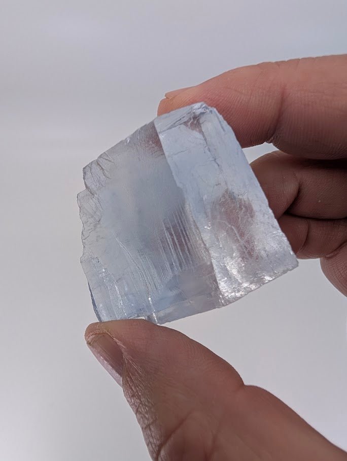 Blue halite specimen with defined cubic core and clear structure