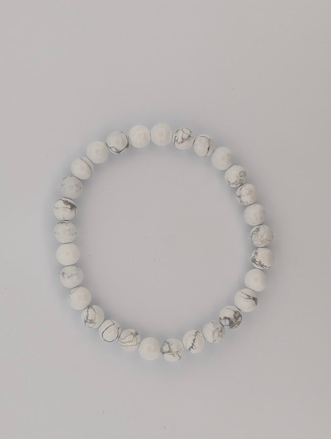 Overhead view of 6mm Howlite round bead stretch bracelet
