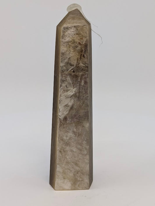 Front view of Golden Mica – 75 g polished metallic crystal