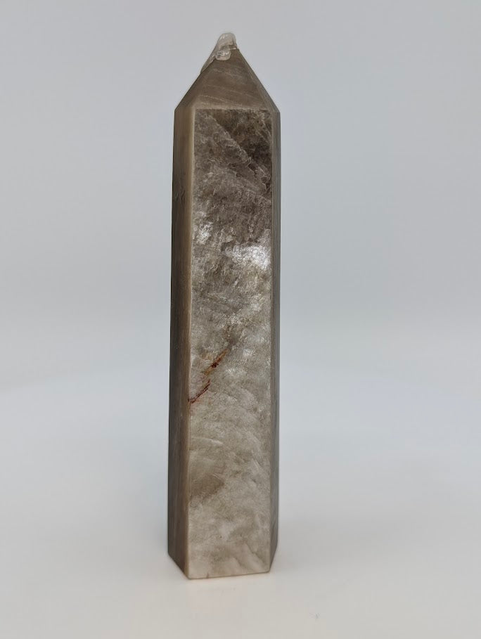 Right side showing warm metallic tone and natural oxidation vein