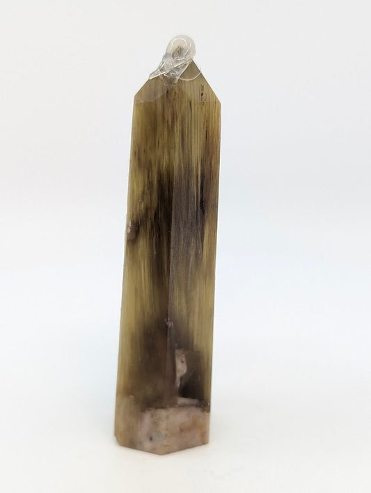 Left profile showing fibrous bronze alignment and quartz contact zone