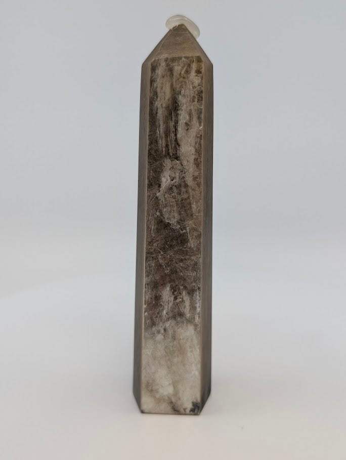 Right side with golden-silver luster and clean faceting