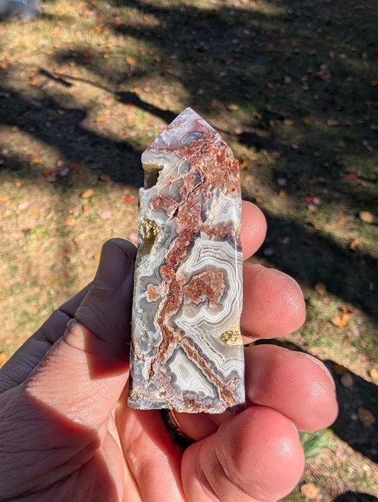 Mexican Lace Agate Tower #3 side view — banded chalcedony showing warm and cool lace tones