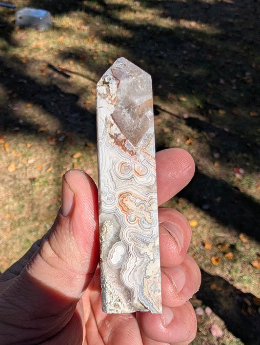 Mexican Lace Agate Tower #4 side view — banded chalcedony showing cream and peach tones