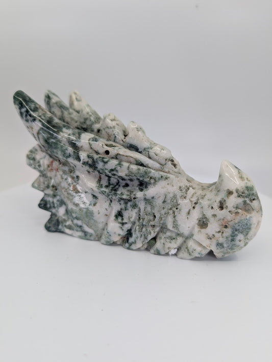 Front view of Moss Agate Dragon Head B, 640g, stronger green moss pattern