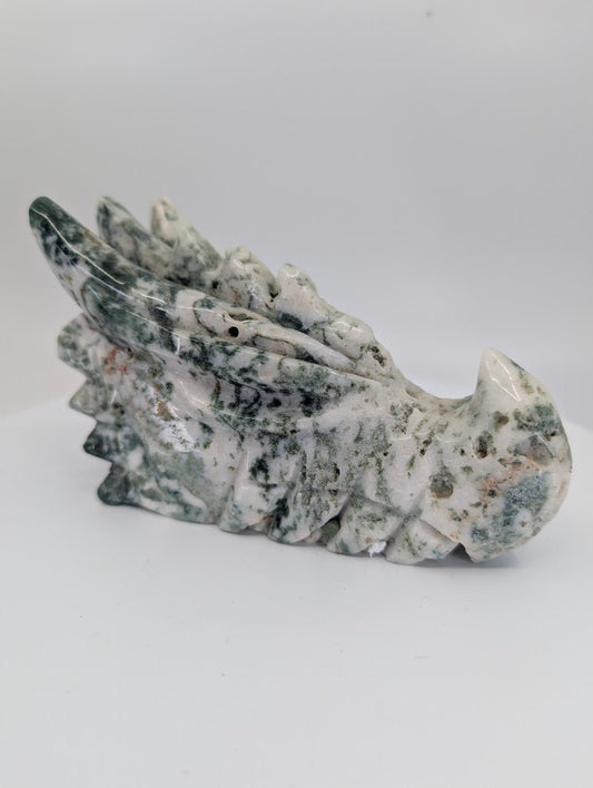 Front view of Moss Agate Dragon Head B, 640g, stronger green moss pattern