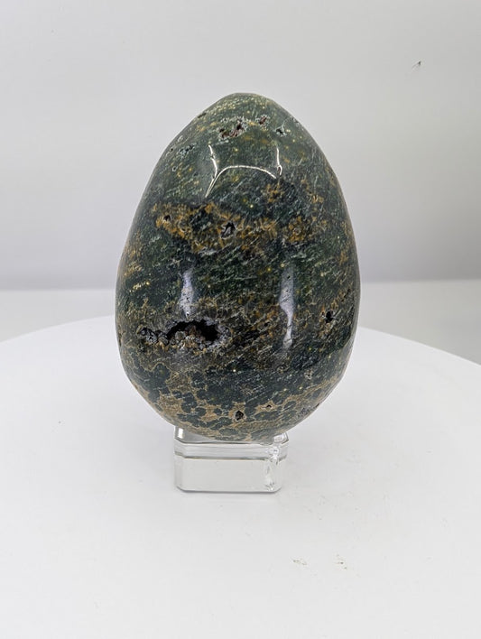 Ocean jasper egg from Madagascar, Piece B, with layered banding and earthy green-grey tones