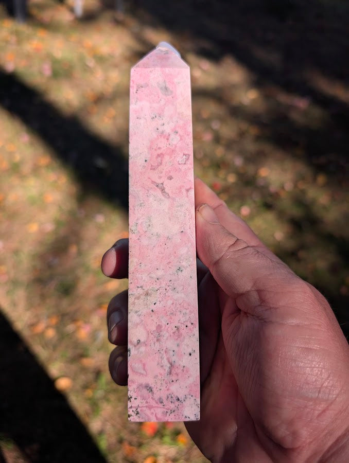 Right face of rhodonite tower #3 showing gentle veining and smooth high polish
