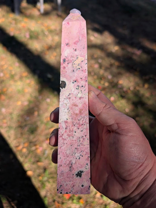 Left face of rhodonite tower #4 with soft pink marbling and fine manganese specks