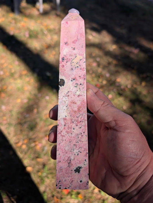Left face of rhodonite tower #4 with soft pink marbling and fine manganese specks