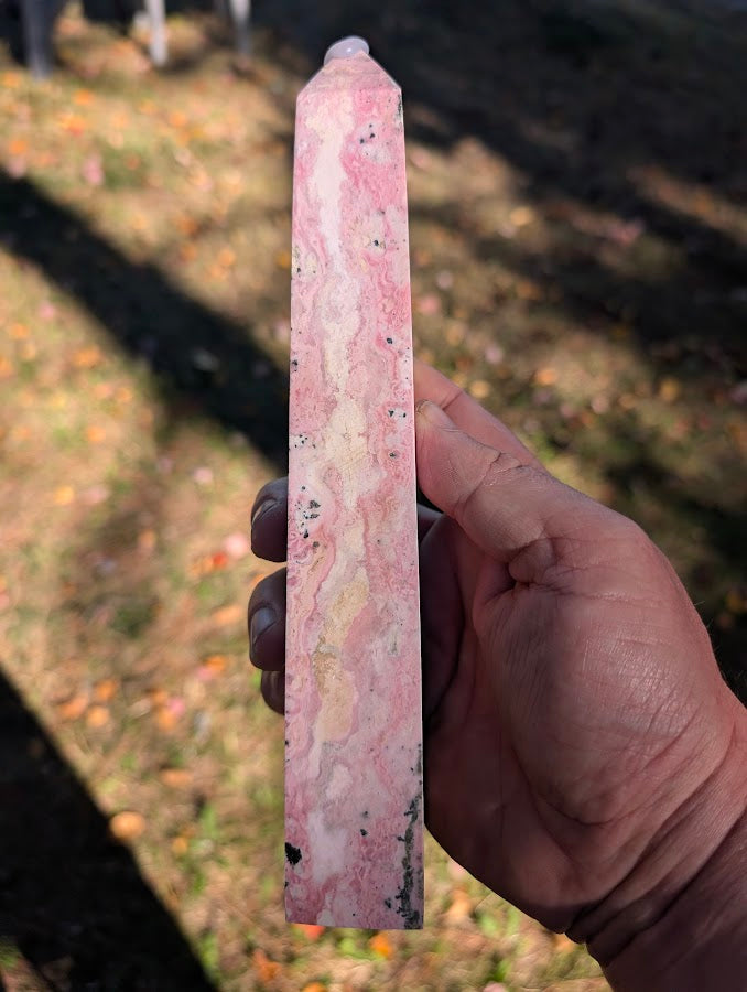 Right face of tower #4 showing tall profile with delicate veining and polished finish