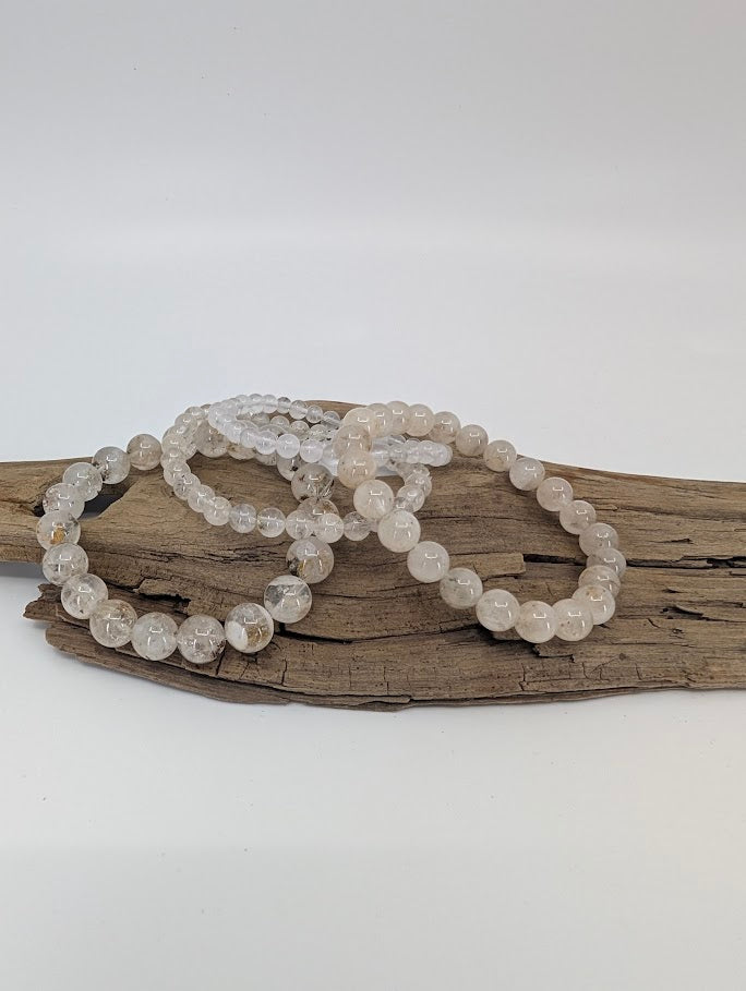 Petroleum Quartz Bracelet close-up of 8mm beads under natural light showing internal inclusions