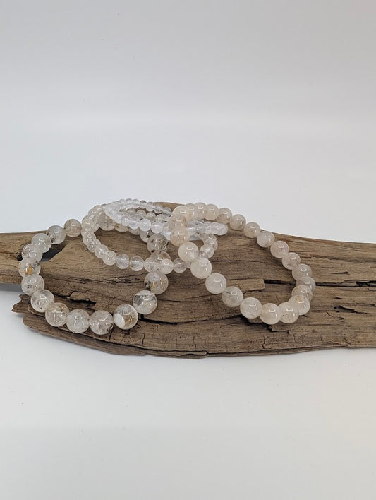 Petroleum Quartz Bracelet close-up of 8mm beads under natural light showing internal inclusions