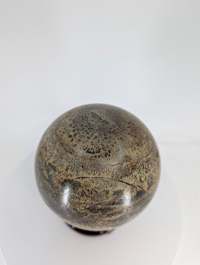 Top view of Picture Jasper sphere displaying fine dendritic textures