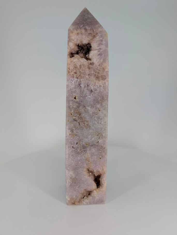 Front view of Pink Amethyst tower showing geode openings