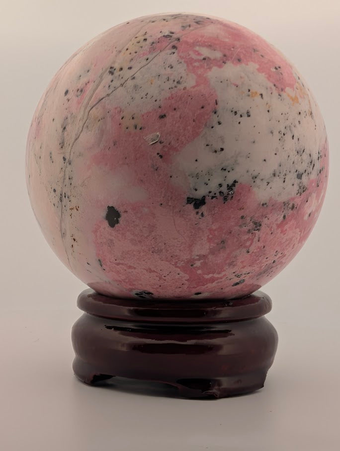 Polished surface showing organic inclusions and cavity