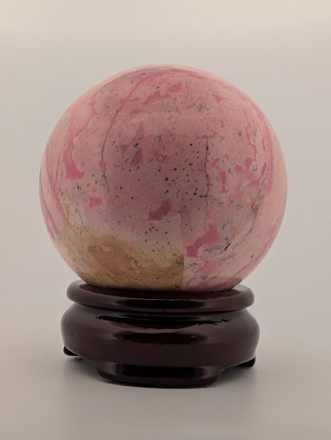 Side angle highlighting natural marbling and soft polish