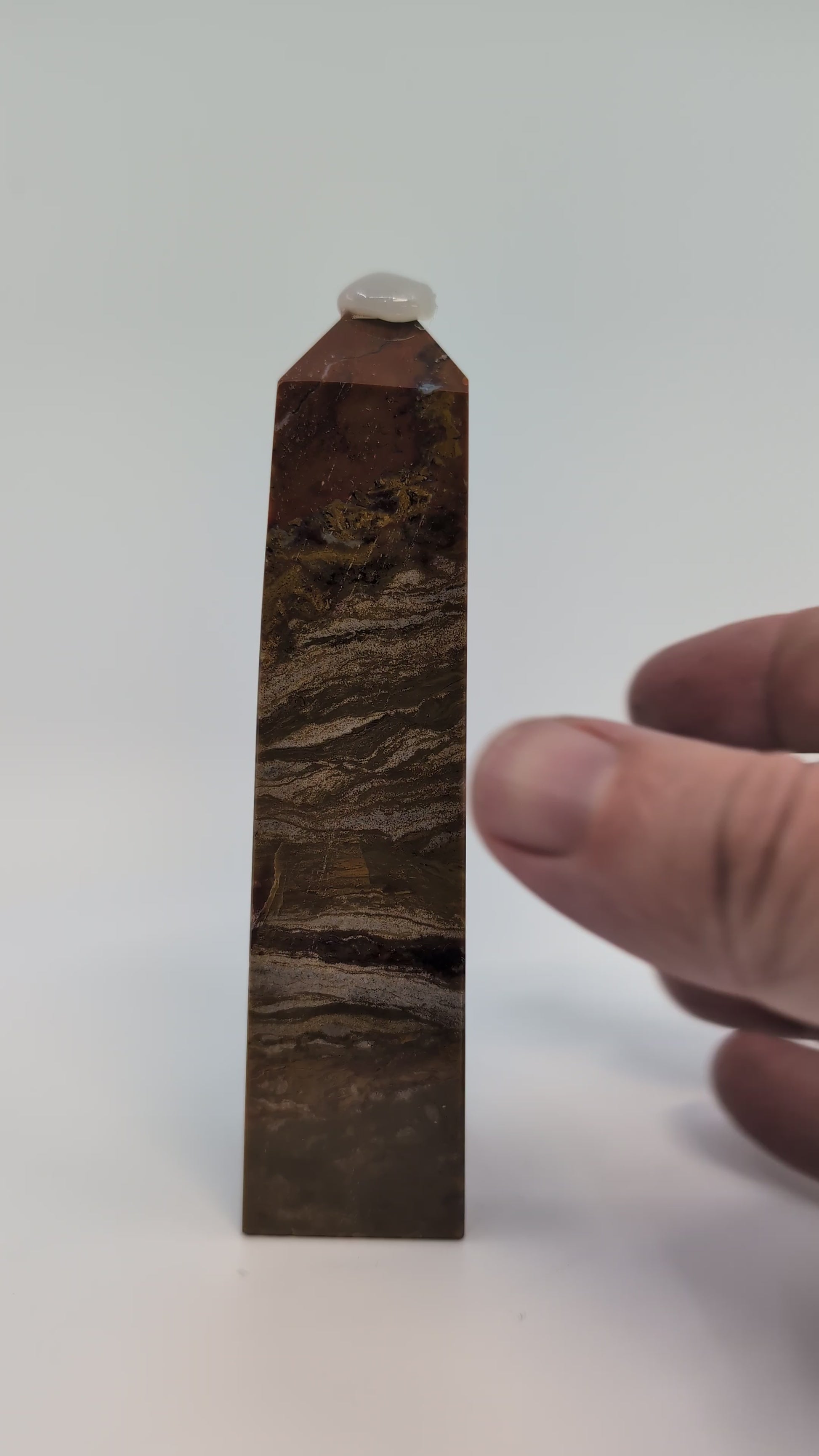 Ocean Jasper Tower OJ-01 video – 12.4 cm, 220 g, brown and tan orbicular patterns from Madagascar. Hand-polished tower showing natural surface details and banding.