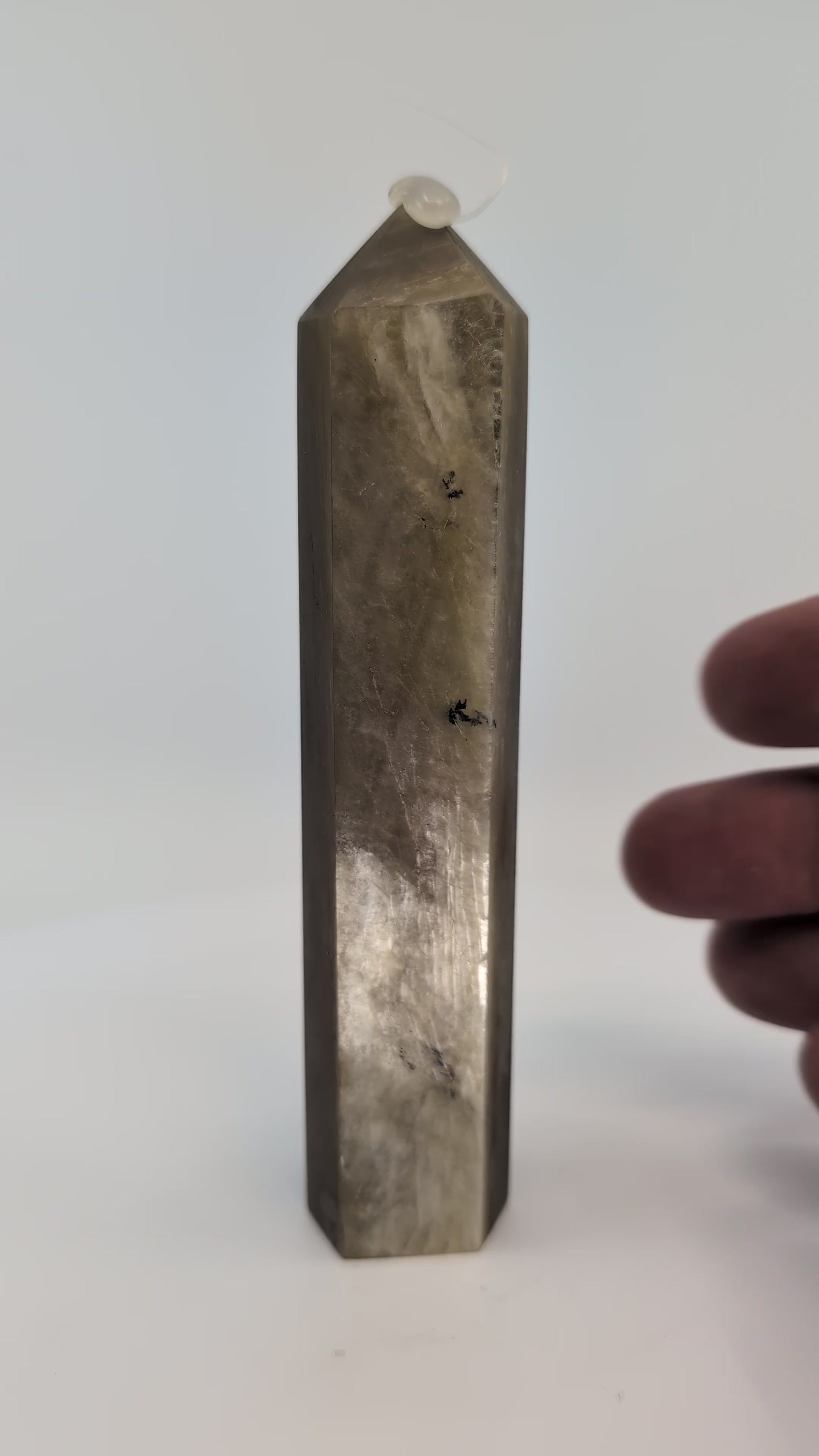 360° rotation video of Golden Mica tower showing golden sheen and fibrous alignment