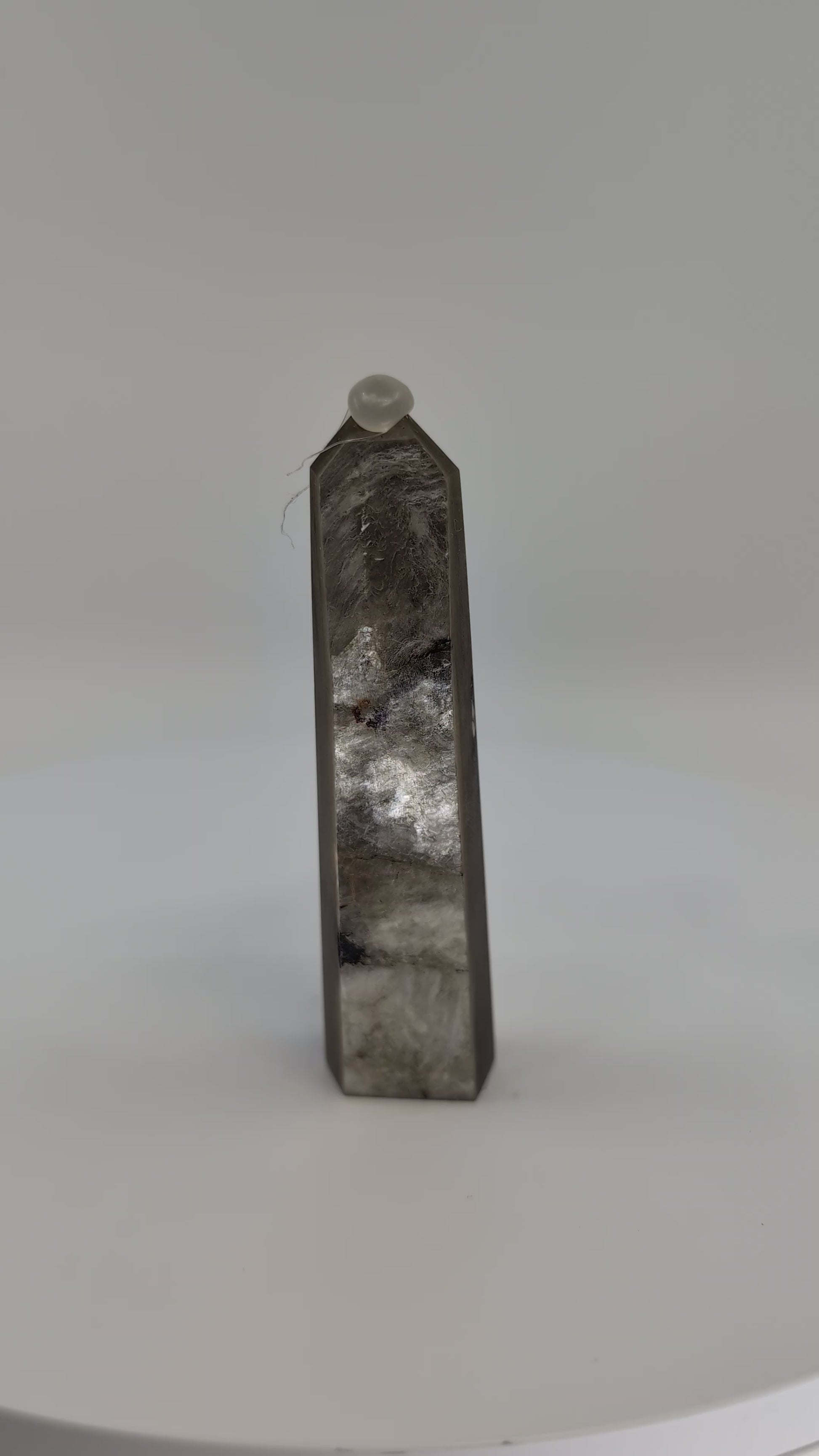 360° rotation video showing polished Golden Mica tower with metallic bronze sheen